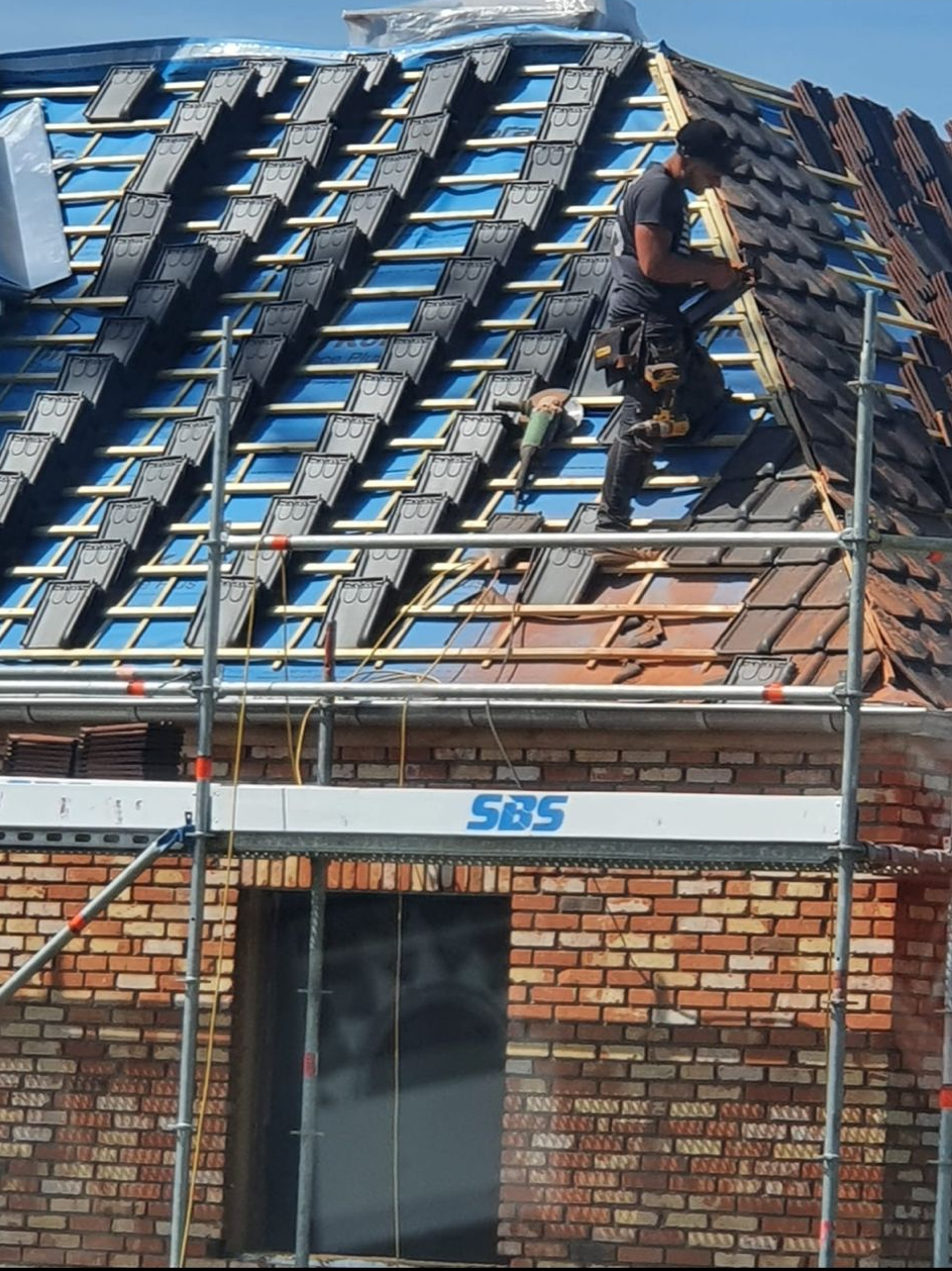 Hellende daken werken